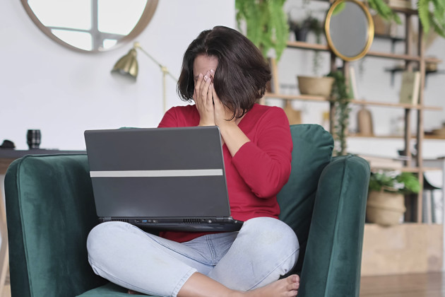 Unhappy Frustrated Woman With Laptop