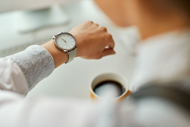 Close Up Of Businesswoman Checking Time On Her Wri 2023 11 27 04 55 08 Utc